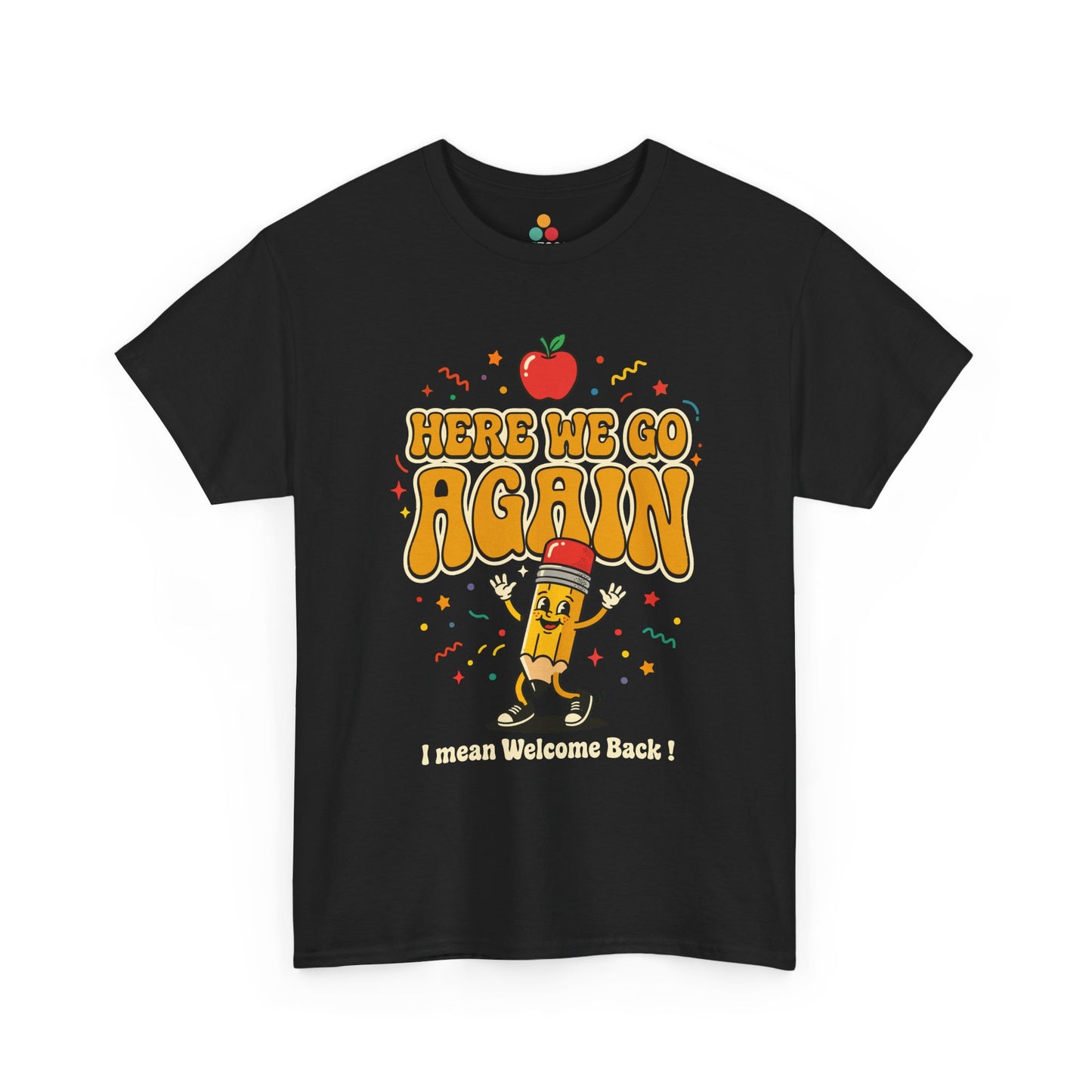 Close-up of a black T-shirt featuring a funny back to school design with the words “Here We Go Again” and “I mean Welcome Back!” plus a red apple and a pencil character.
