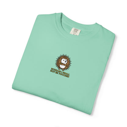 Close-up of an Island Reef Comfort Colors® shirt featuring an embroidered hedgehog in a defensive curl with the saying "Huzzah! I Shall Not Be Touched."

