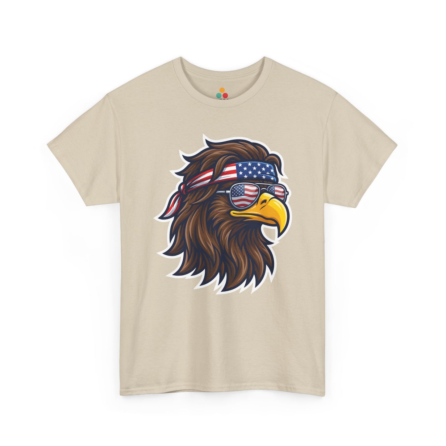 Close-up view of TEEZOCA T-Shirt featuring a fierce bald eagle wearing a USA flag bandana and star-spangled sunglasses printed on biege fabric.

