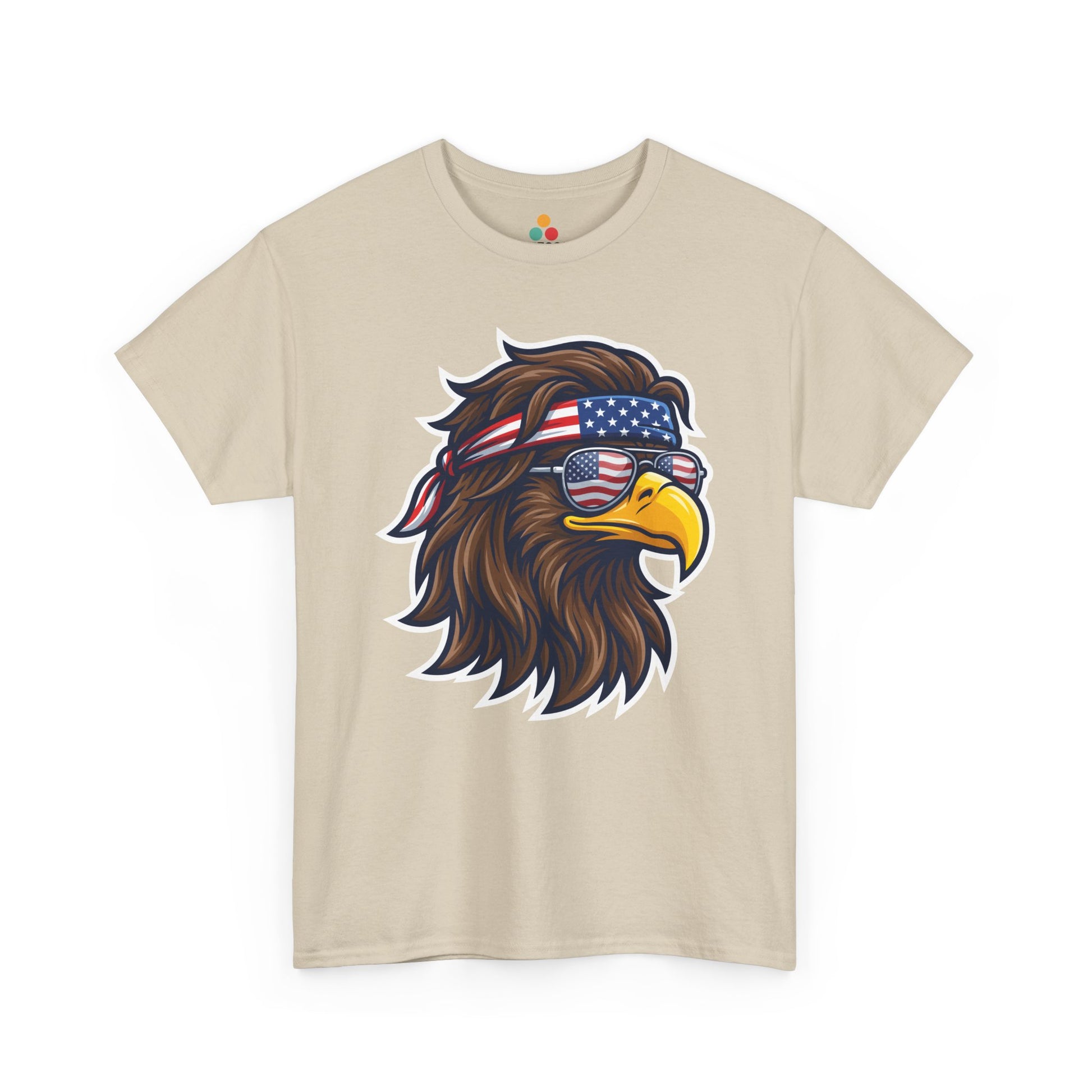 Close-up view of TEEZOCA T-Shirt featuring a fierce bald eagle wearing a USA flag bandana and star-spangled sunglasses printed on biege fabric.

