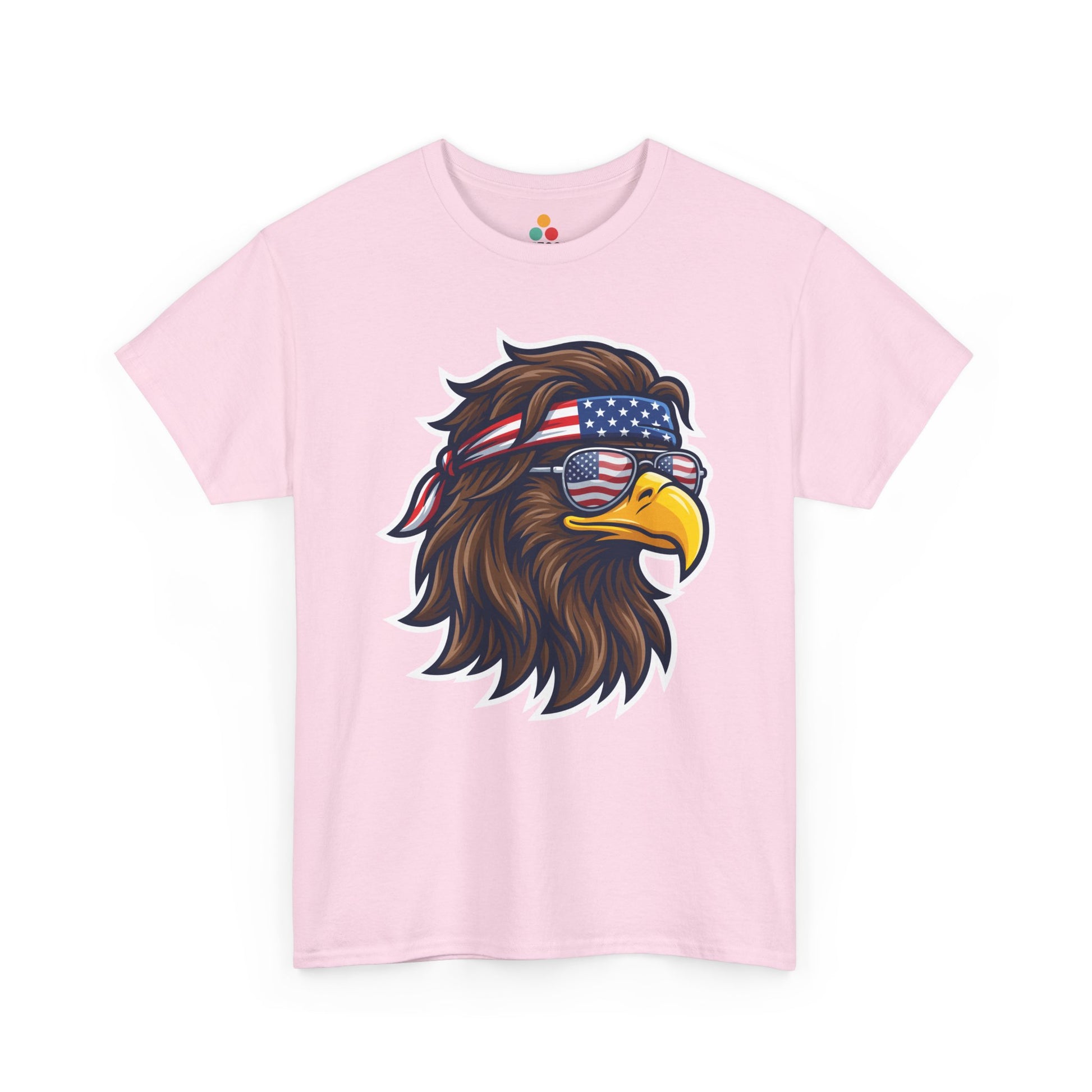 Close-up view of TEEZOCA T-Shirt featuring a fierce bald eagle wearing a USA flag bandana and star-spangled sunglasses printed on pink fabric.

