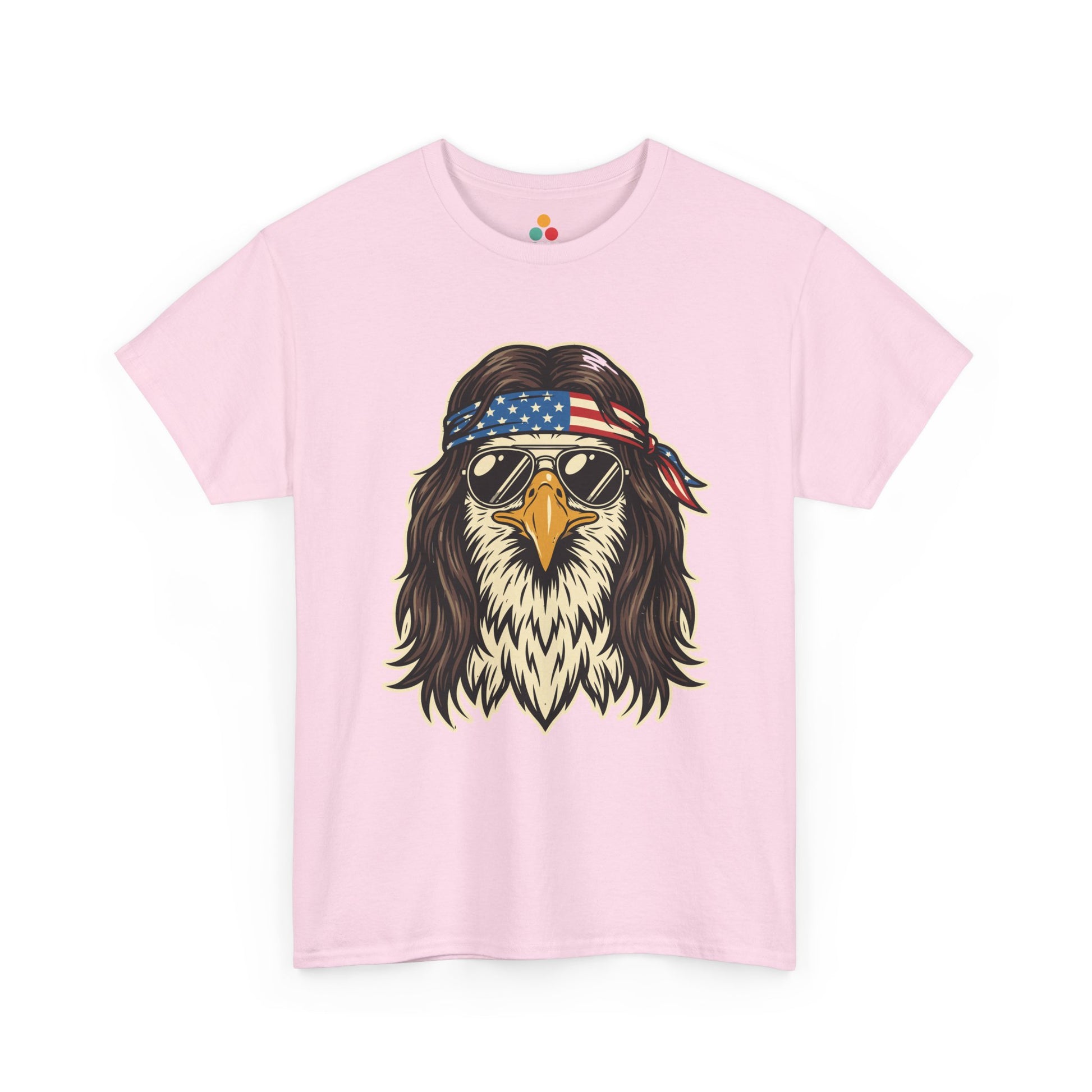 Close-up view of TEEZOCA light pink T-Shirt featuring a bald eagle with a mullet, American flag bandana, and gold aviator sunglasses — patriotic 4th of July 2026 America 250 gift tee.

