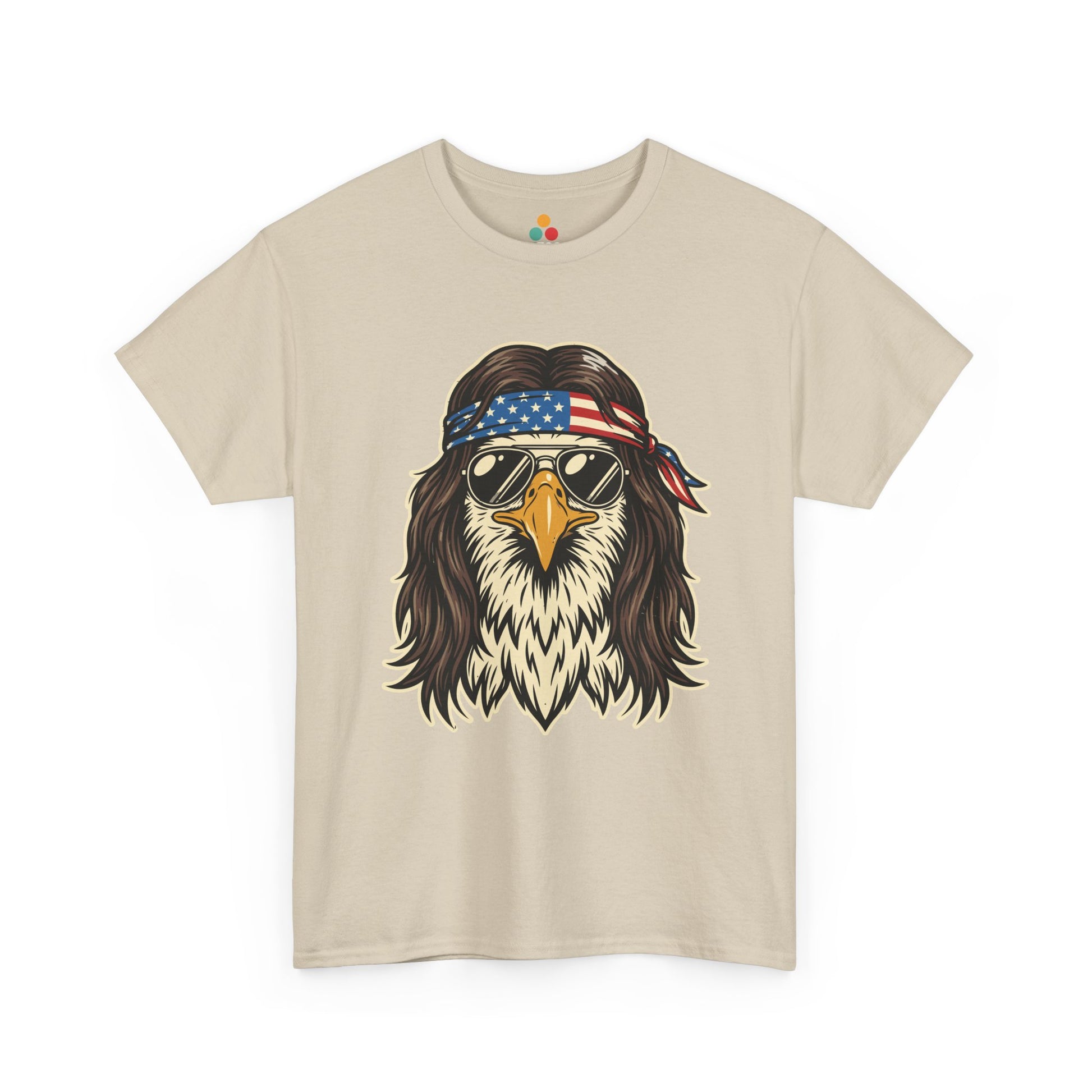 Close-up view of TEEZOCA sand T-Shirt featuring a bald eagle with a mullet, American flag bandana, and gold aviator sunglasses — retro patriotic USA 250 years of freedom eagle graphic tee.

