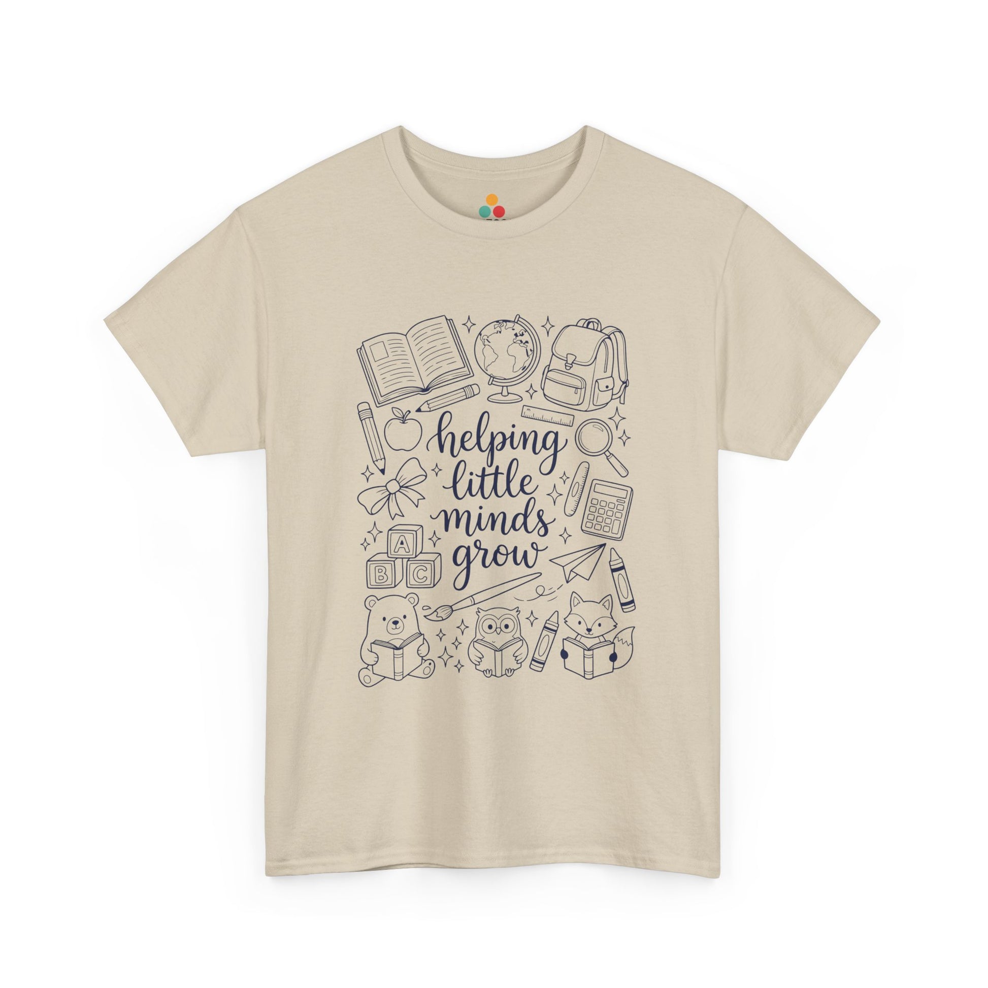 Close up view of TEEZOCA T-Shirt with black and white “helping little minds grow” back to school teacher design on Biege fabric.

