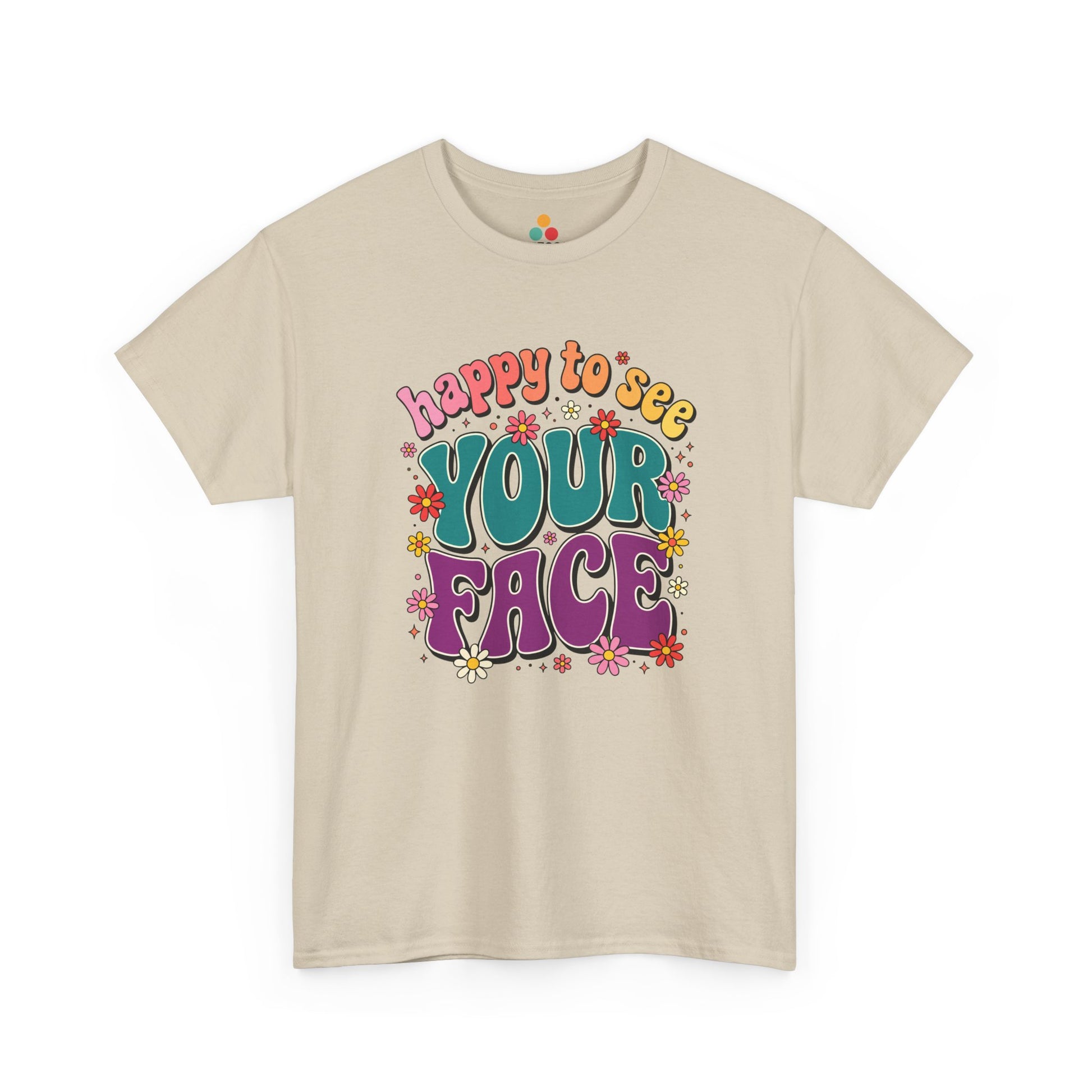  Close up view of TEEZOCA T-Shirt with colorful “Welcome Back to School” cartoon design featuring smiling flowers, stars, and a pencil on Beige shirt

