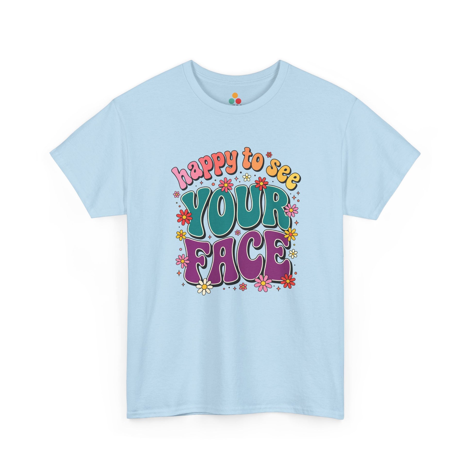  Close up view of TEEZOCA T-Shirt with colorful “Welcome Back to School” cartoon design featuring smiling flowers, stars, and a pencil on light Blue shirt


