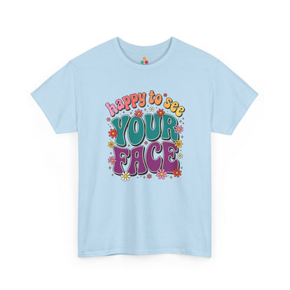  Close up view of TEEZOCA T-Shirt with colorful “Welcome Back to School” cartoon design featuring smiling flowers, stars, and a pencil on light Blue shirt

