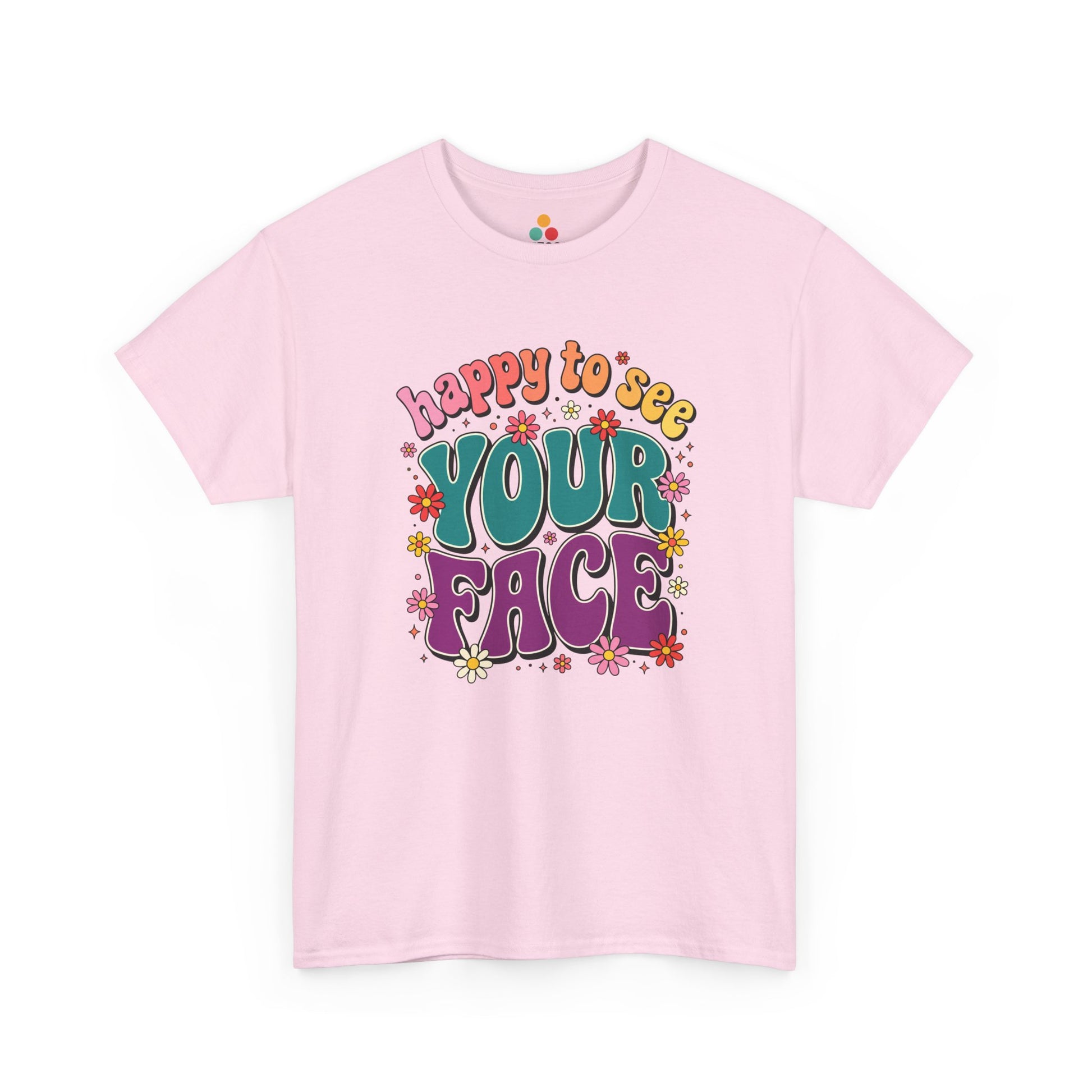  Close up view of TEEZOCA T-Shirt with colorful “Welcome Back to School” cartoon design featuring smiling flowers, stars, and a pencil on light Pink shirt

