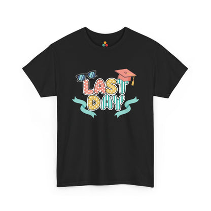 Flat lay of black t-shirt featuring TEEZOCA colorful Last Day design with grad cap and sunglasses.