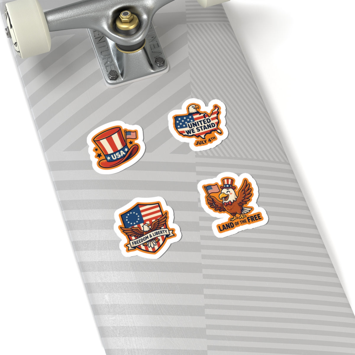 Four unique TEEZOCA vinyl cartoon patriotic stickers decorating the surface of a light grey striped skateboard.