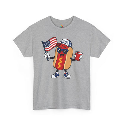 Funny 4th of July Shirt Hot Dog USA BBQ Graphic T-shirt Gift | TEEZOCA 4th of July hot dog shirt t-shirt showing a cheerful hot dog mascot with American flag and cookout energy.
