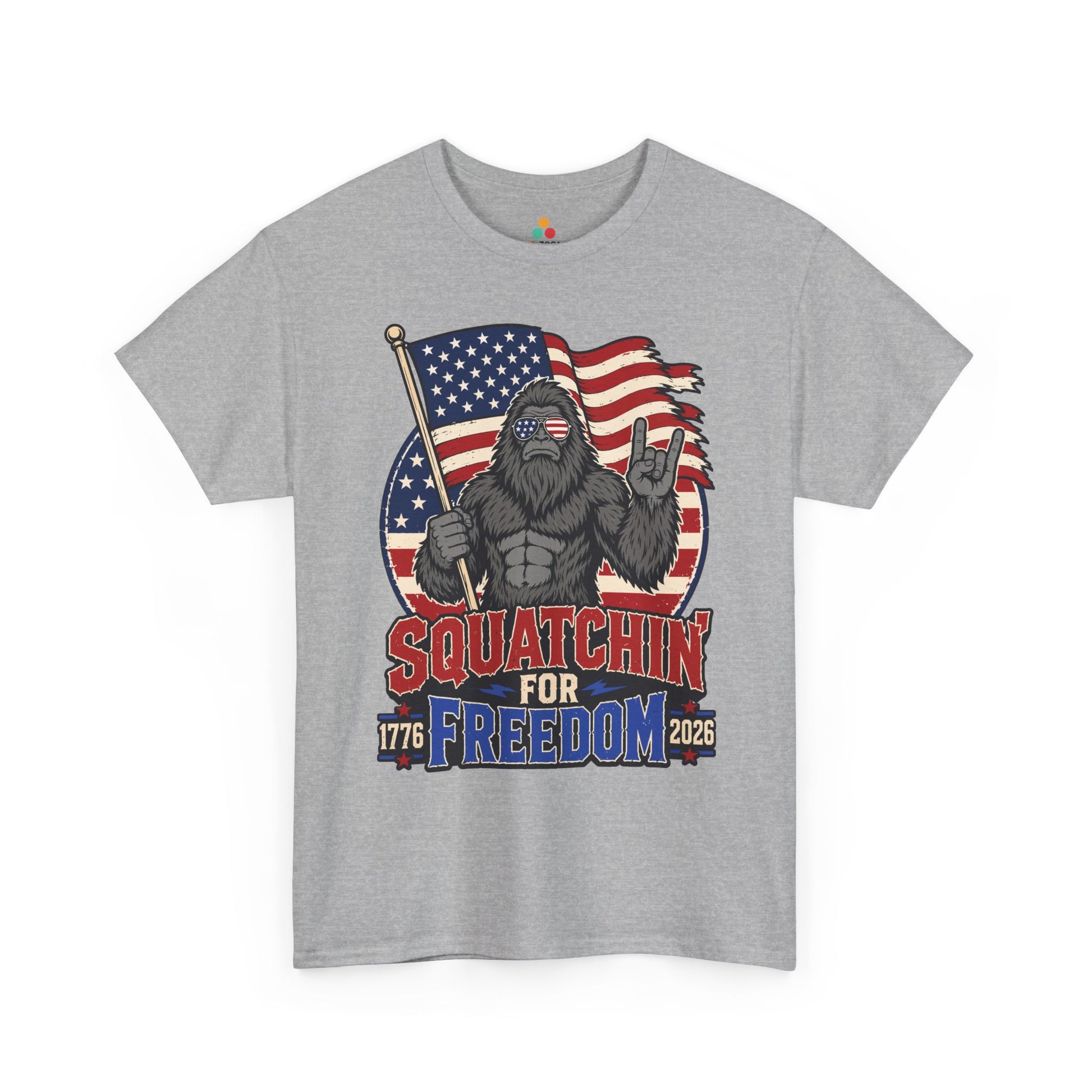 Funny Sasquatch T-shirt from TEEZOCA with Squatchin' For Freedom artwork for BBQs, camping trips, and July 4 shirts.
