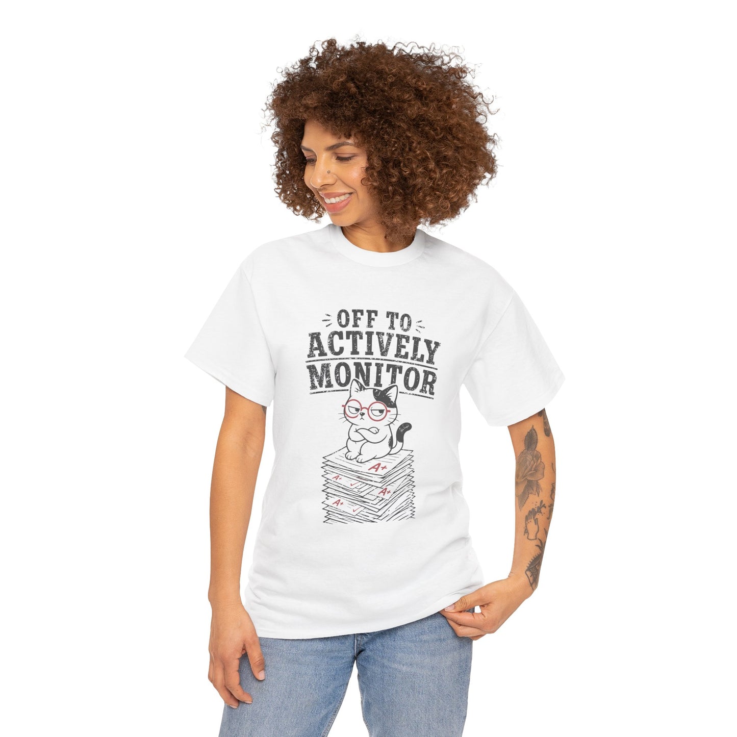Funny teacher shirt by TEEZOCA with a cat wearing glasses, stacked grading papers, and actively monitor message.
