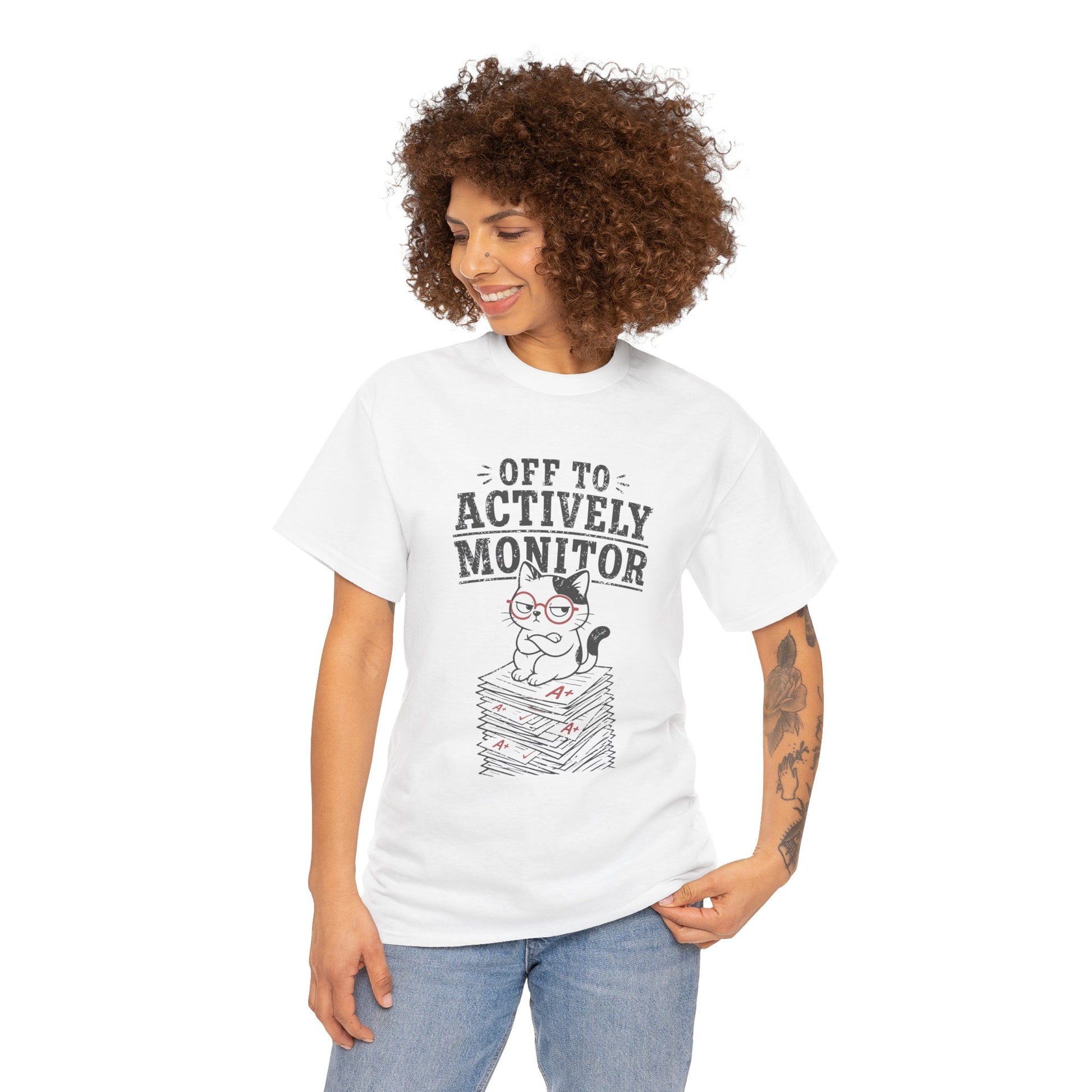Funny teacher shirt by TEEZOCA with a cat wearing glasses, stacked grading papers, and actively monitor message.
