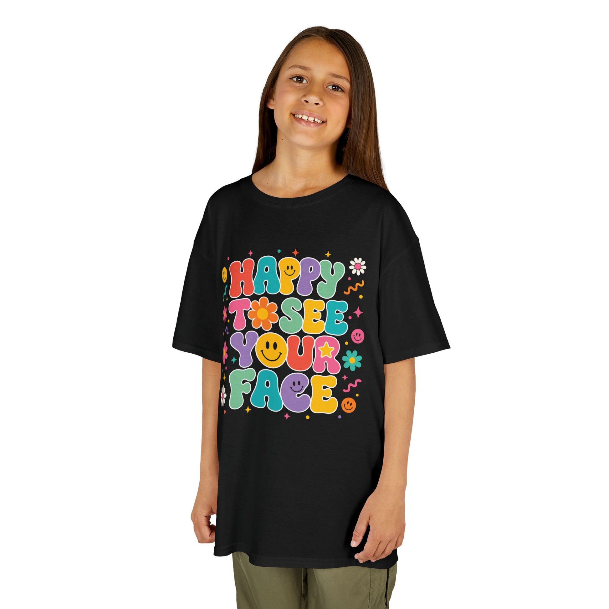 Girl wearing a black TEEZOCA Happy to See Your Face groovy kids tee, a cute retro back to school shirt for the new school year.
