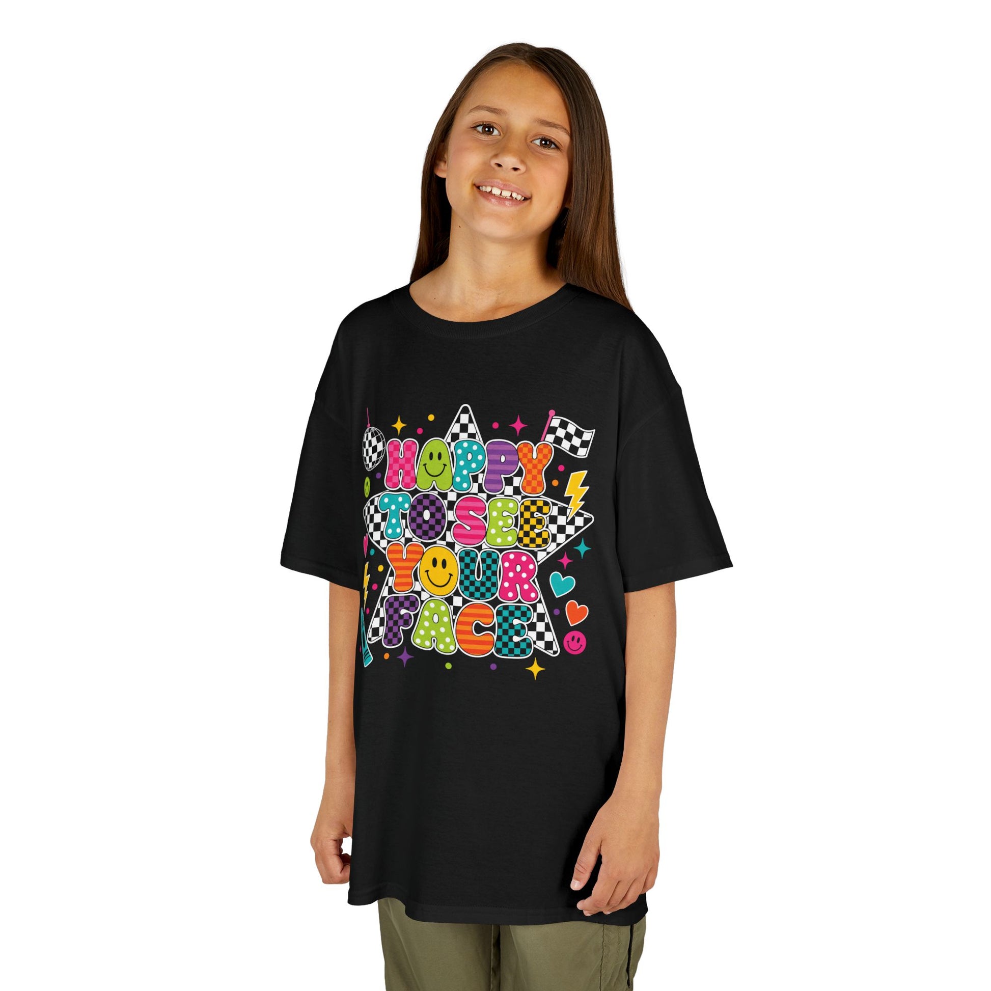 Girl wearing a black TEEZOCA Happy to See Your Face kids tee, a cute back to school shirt for the new school year.
