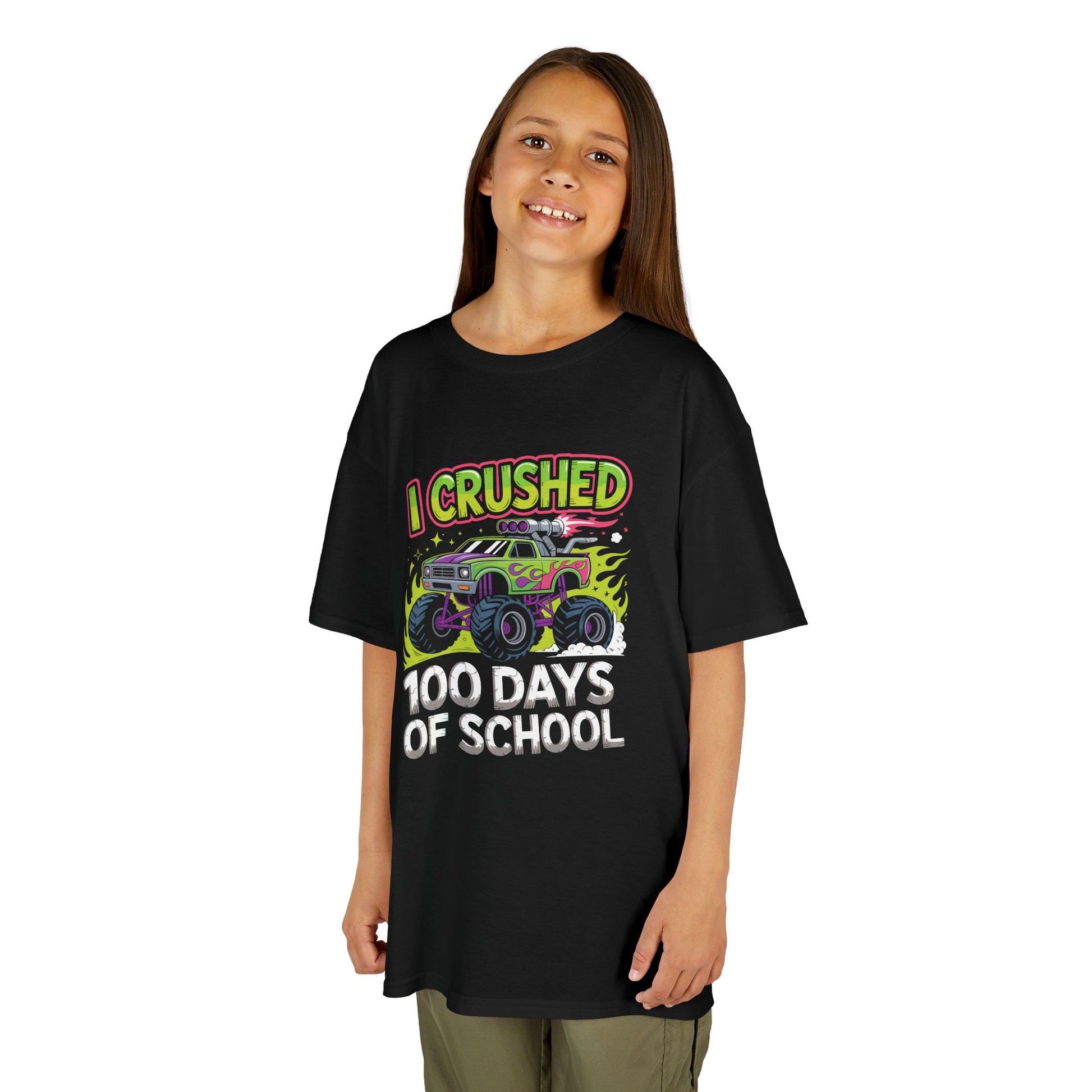 Girl wearing a black TEEZOCA “I Crushed 100 Days Of School” 100th day monster truck shirt.