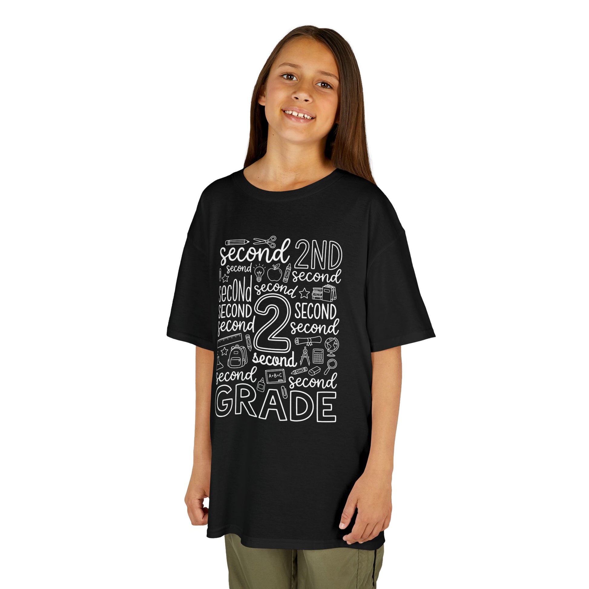 Girl wearing a black TEEZOCA second grade typography kids tee reading second grade, a cute first-day-of-school shirt.
