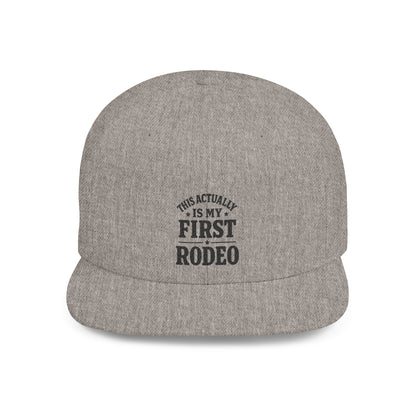 Gray cap with text 'This actually is my first rodeo' on a white background