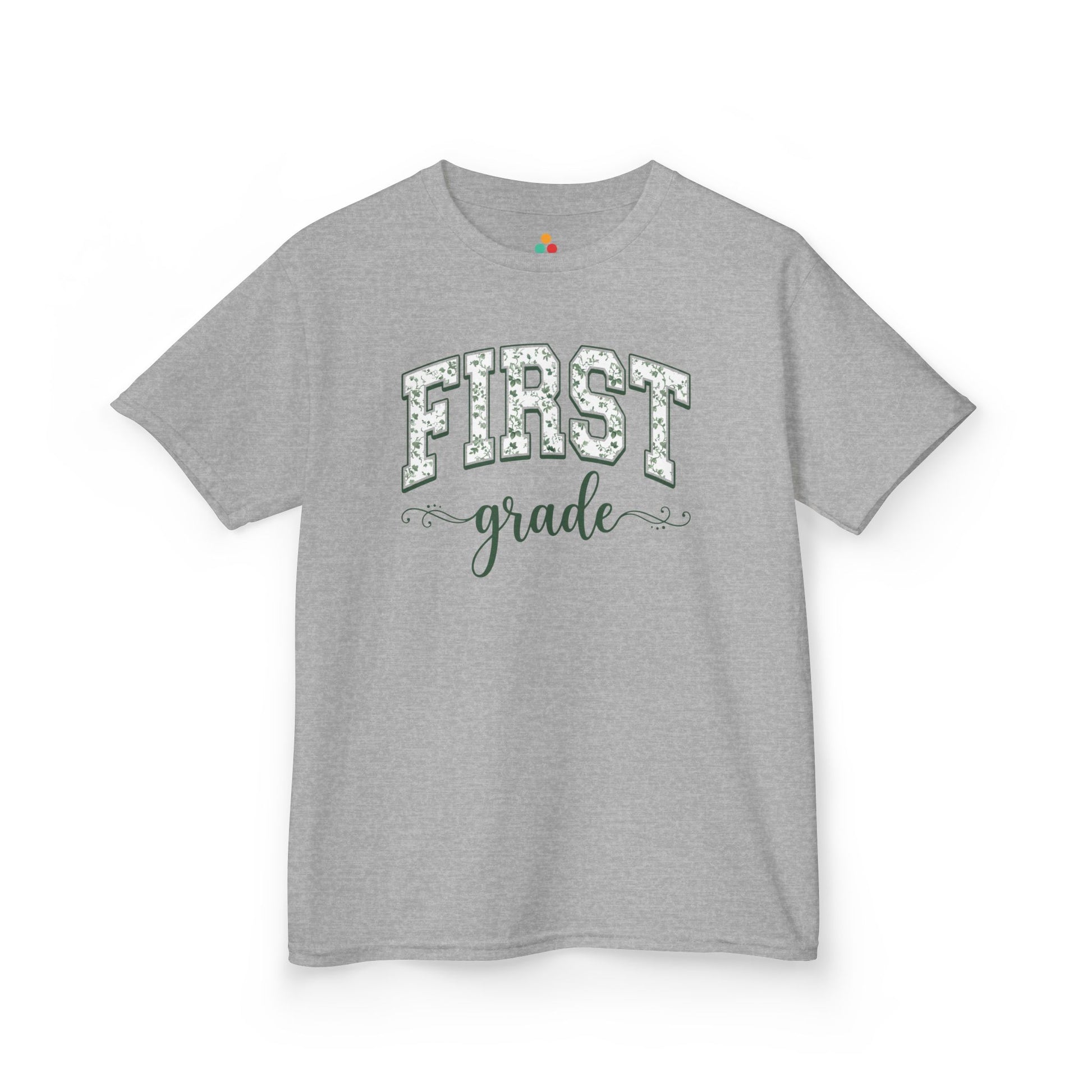 Gray t-shirt with white text on a white background. Cute first grade kids t-shirt from TEEZOCA for the first day of first grade, styled for a new first grader.
