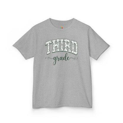 Gray t-shirt with white text on a white background. Cute third grade kids t-shirt from TEEZOCA for the first day of third grade, styled for a new third grader.
