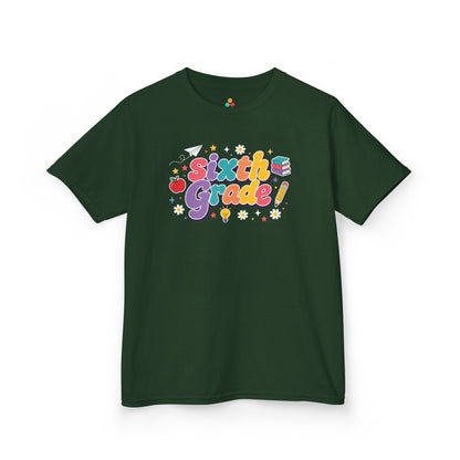 Green t-shirt with 'Sixth Grade!' text and graphics on a white background. TEEZOCA t-shirt with rainbow school lettering for parents browsing a 6th grade shirt for girls.