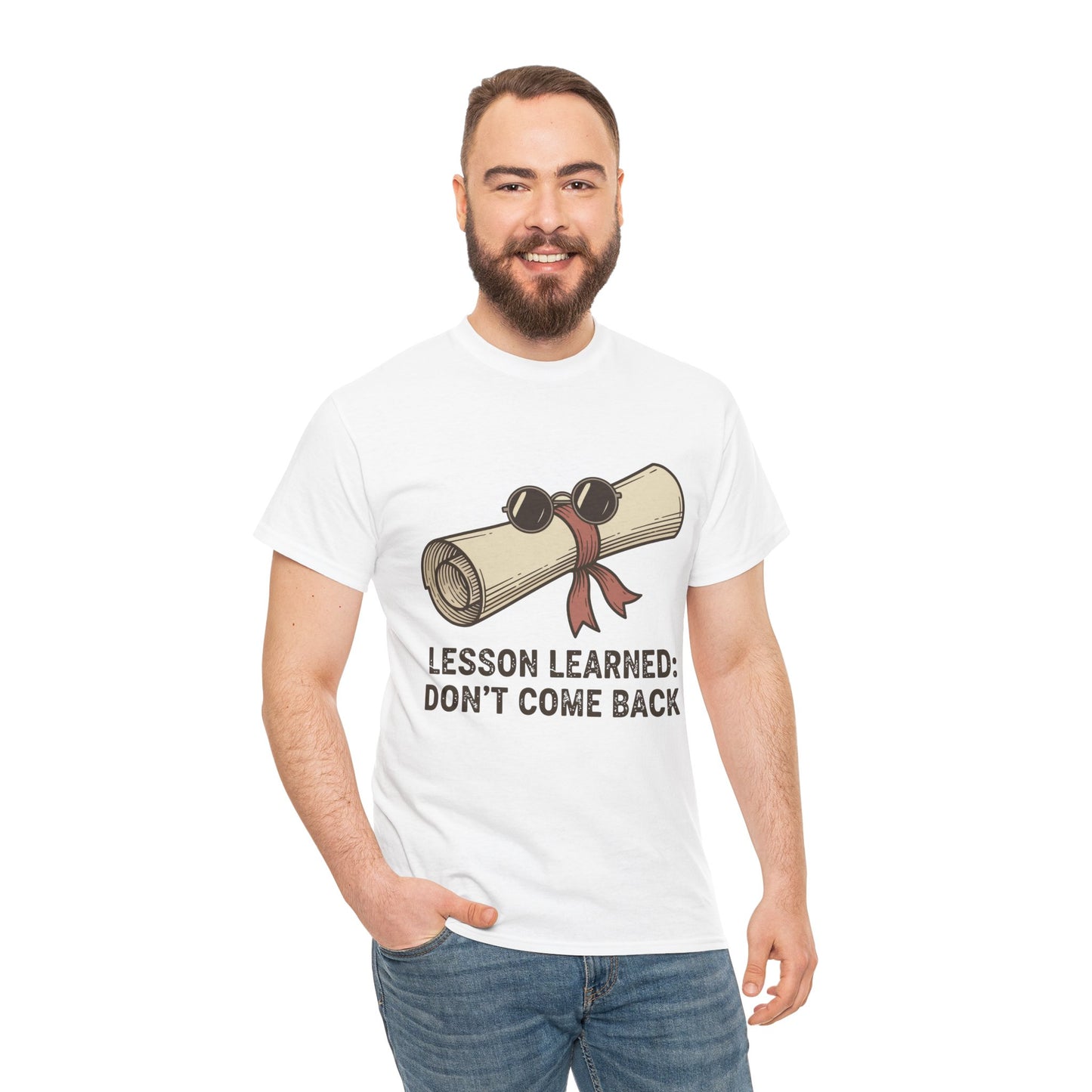 Male model smiling wearing TEEZOCA Lesson Learned T-Shirt with sarcastic graduation design in white.