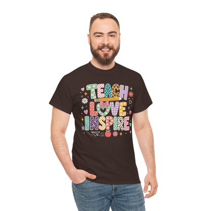 Male teacher wearing a dark chocolate TEEZOCA Teach Love Inspire tee, a unisex back to school shirt for classroom staff.
