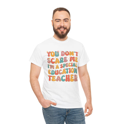 Man Wearing TEEZOCA You Don’t Scare Me I’m a Special Education Teacher Groovy White T-Shirt Funny Teacher Gift 