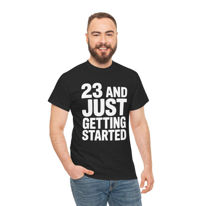 Man wearing a black t-shirt with '23 AND JUST GETTING STARTED' text on a white background