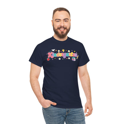 Man wearing a navy blue t-shirt. TEEZOCA t-shirt displays coral, teal, yellow, peach, and lavender “Kindergarten” lettering for matching kindergarten teacher squad shirts.