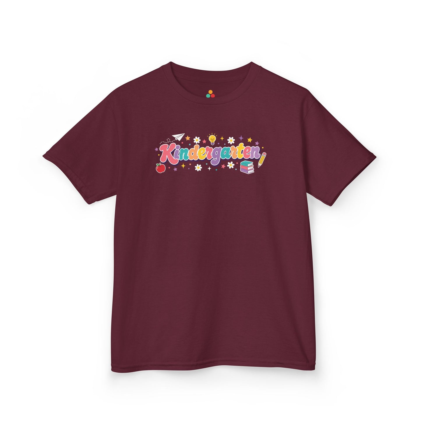 Maroon t-shirt with 'Protect Trans Kids' graphic on a white background. TEEZOCA t-shirt with books, pencil, apple, flowers, and rainbow letters for shoppers browsing kindergarten shirts for boys.