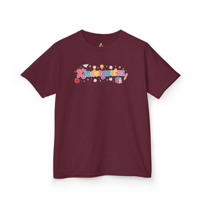 Maroon t-shirt with 'Protect Trans Kids' graphic on a white background. TEEZOCA t-shirt with books, pencil, apple, flowers, and rainbow letters for shoppers browsing kindergarten shirts for boys.