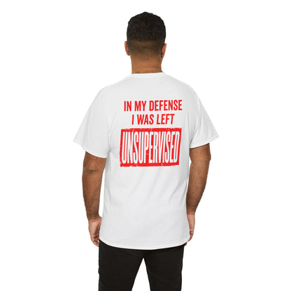 Men wearing a Back Print of a light pink T-shirt featuring the bold red and cream quote “In My Defense I Was Left Unsupervised,” a funny back print statement tee with retro typography, sarcastic quote shirt, witty adult humor graphic, dry humor novelty apparel, bold statement t-shirt, and playful sarcasm design for fans of funny quote shirts.
