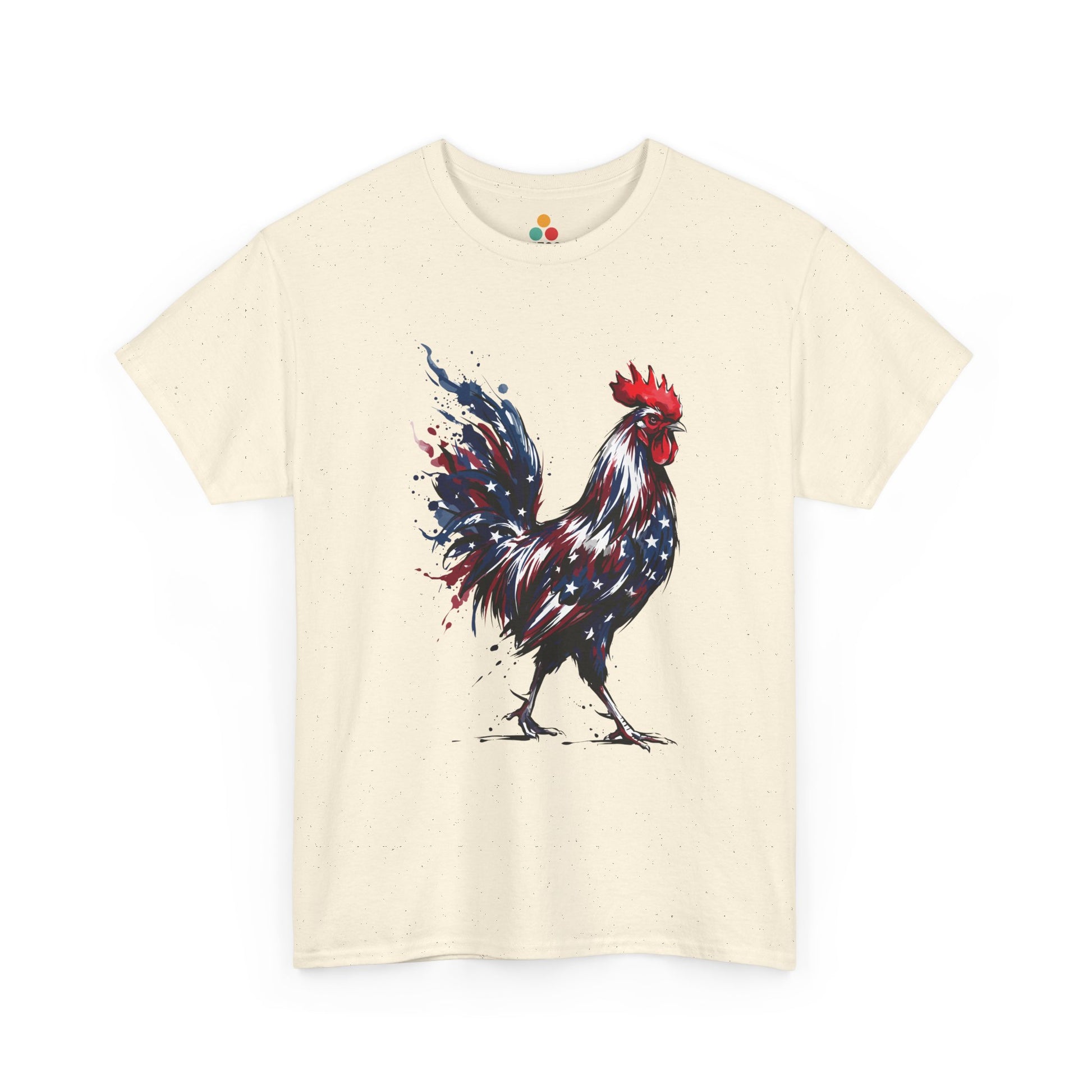 Natural TEEZOCA T-Shirt featuring a bold watercolor-style rooster painted in red, white, and blue American flag colors with stars and paint splashes on white fabric.