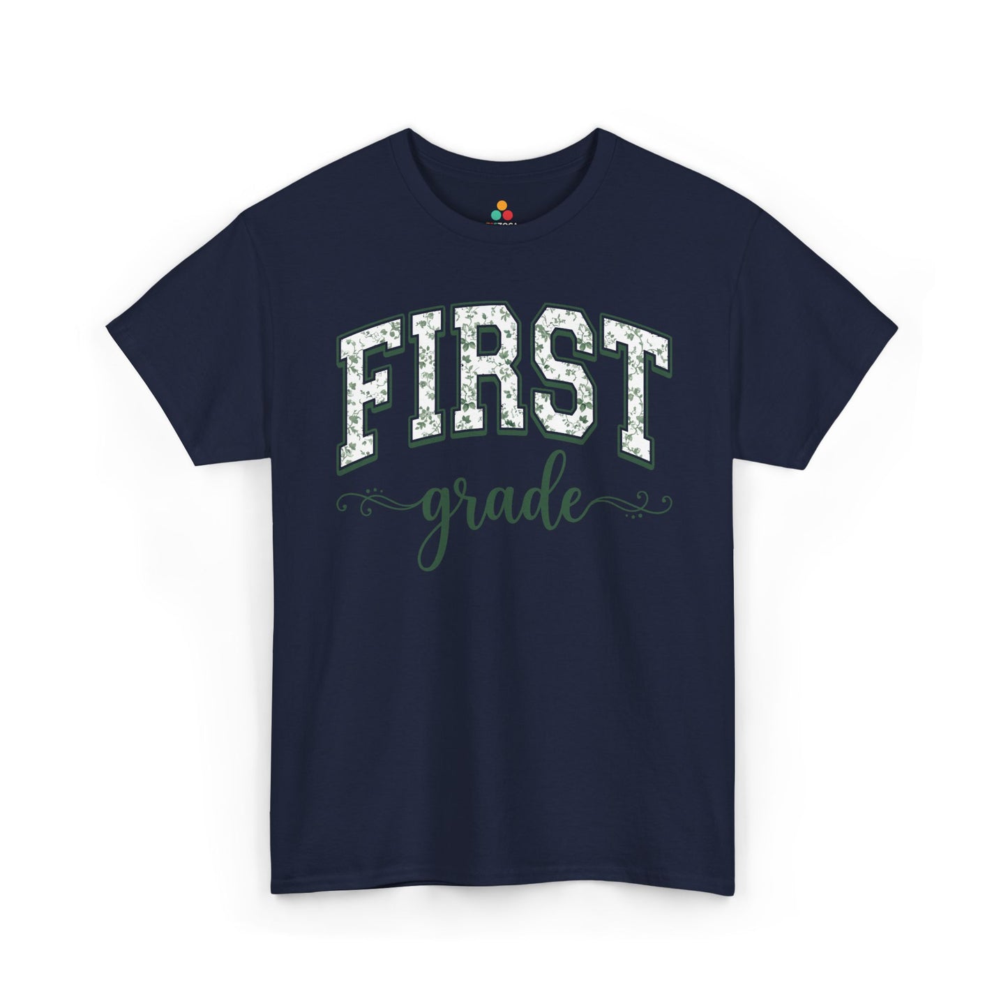 Navy blue t-shirt with 'FIRST grade' text on a white background. Matching first grade shirt by TEEZOCA in sage florals, worn by an adult alongside a new first grader on the first day of school.
