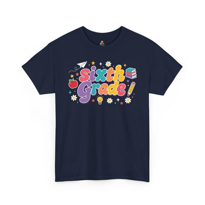 Navy t-shirt with 'Sixth Grade!' text and graphics on a white background. TEEZOCA t-shirt featuring oversized retro “Sixth Grade” bubble lettering, deep purple shadows, school icons, and colorful stars for a sixth grade teacher shirt.