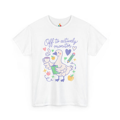 Off to Actively Monitor Cute Teacher Goose Test Day T-Shirt – Funny Teachers State Testing Gift Tee | TEEZOCA Unisex T-shirt with Cute Funny Teacher Shirt Off to Actively Monitor design, featuring a goose, clipboard, books, apples, and hearts.
