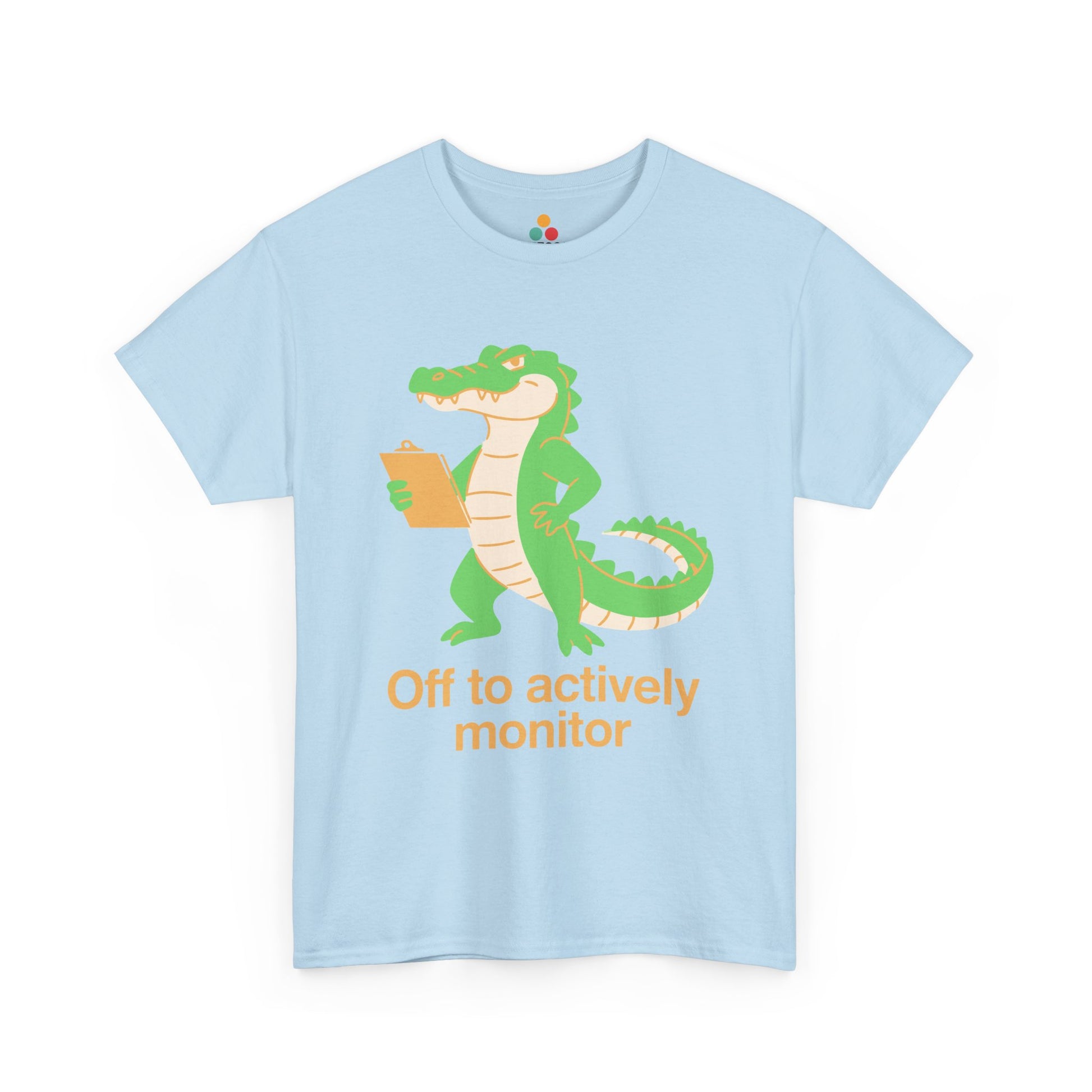 Off to Actively Monitor Funny Test Day School Crocodile T-Shirt – State Testing Gift for Teachers | Science teacher shirt by TEEZOCA with a cute alligator graphic tee design and actively monitoring classroom joke.
