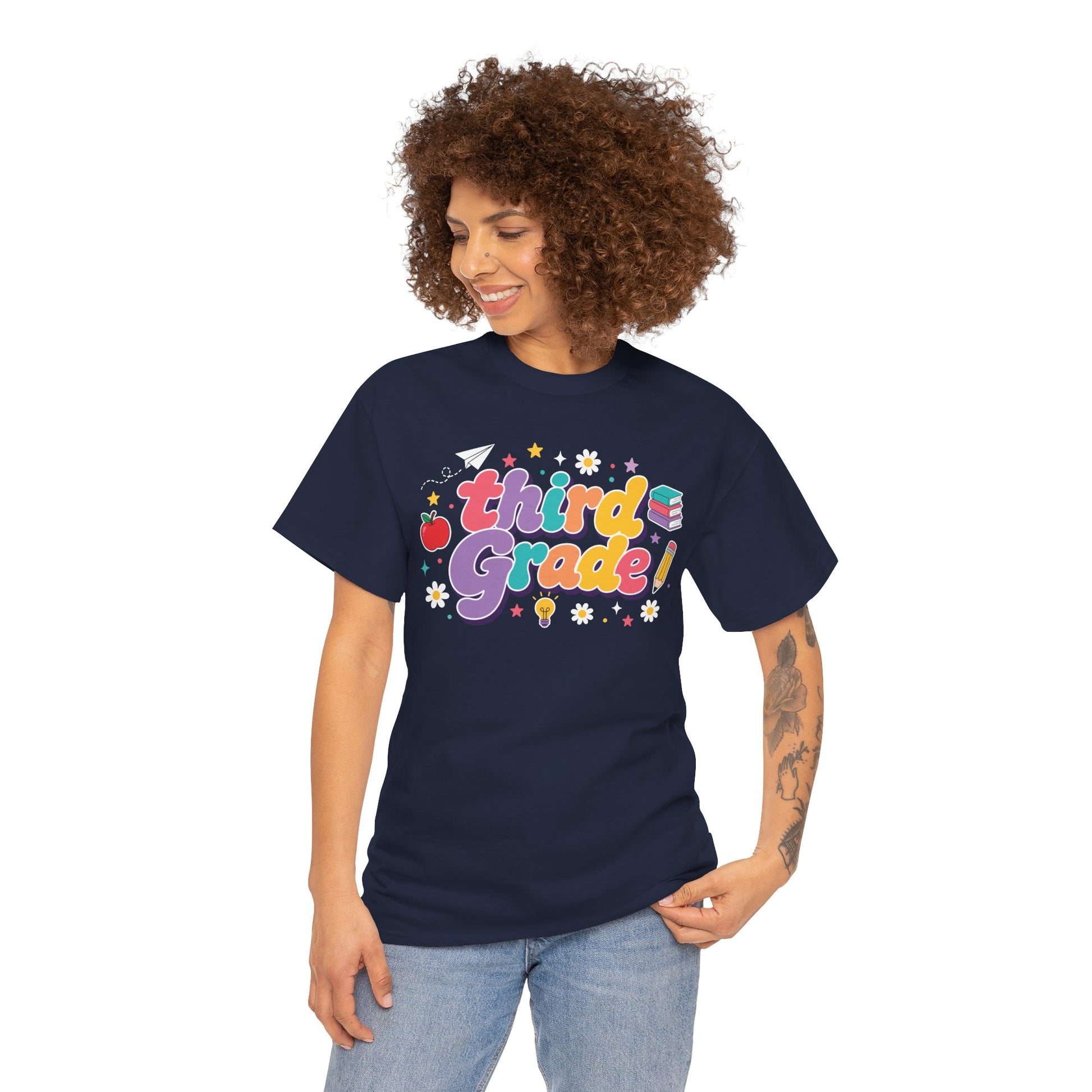 Person wearing a navy t-shirt with a graphic of a sheep and text, on a white background. Created for coordinated educators, this TEEZOCA t-shirt uses colorful bubble lettering and stars for a set of third grade teacher squad shirts.