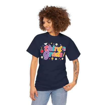 Person wearing a navy t-shirt with a graphic of a sheep and text, on a white background. Created for coordinated educators, this TEEZOCA t-shirt uses colorful bubble lettering and stars for a set of third grade teacher squad shirts.