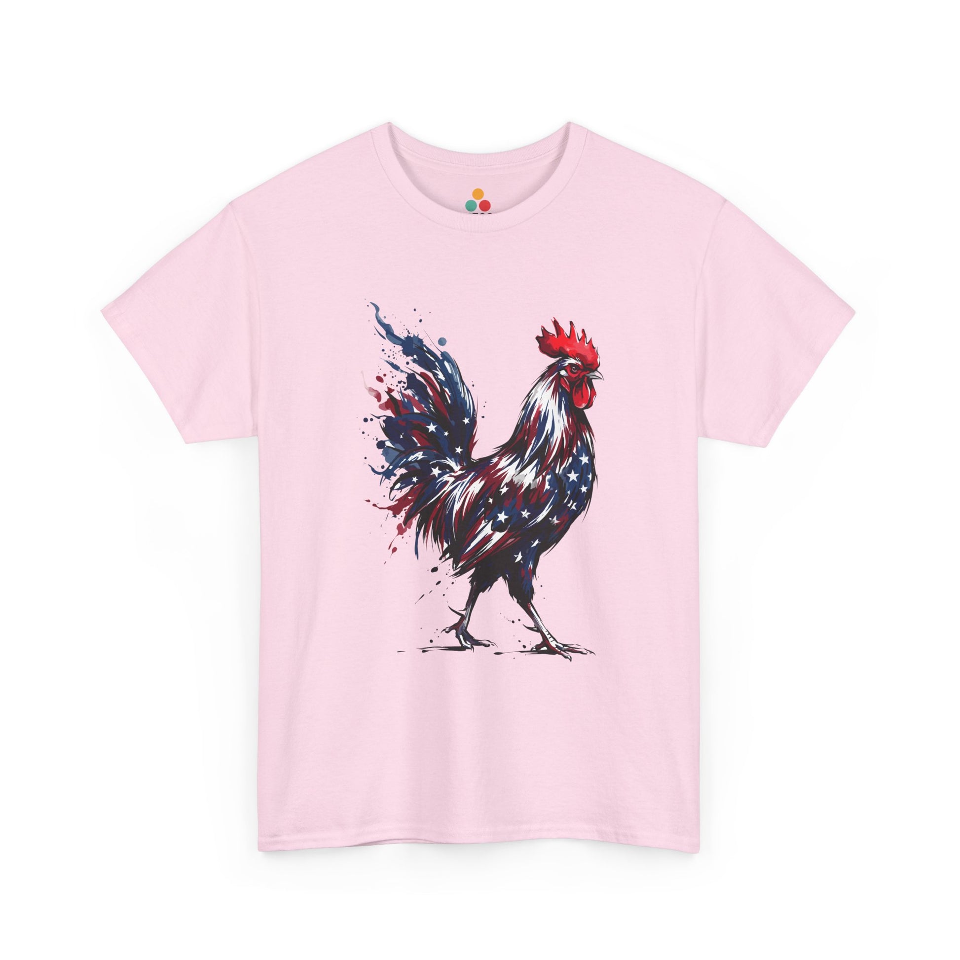 Pink TEEZOCA T-Shirt featuring a bold watercolor-style rooster painted in red, white, and blue American flag colors with stars and paint splashes on white fabric.