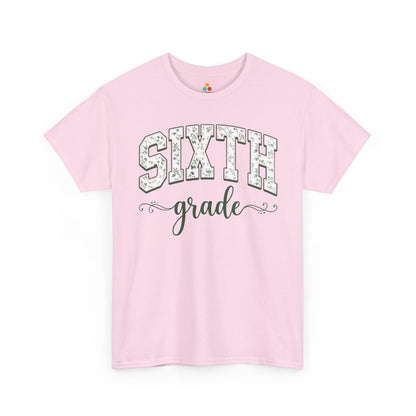 Pink t-shirt with 'Sixth grade' text on a white background. Matching sixth grade shirt by TEEZOCA in sage florals, worn by an adult alongside a new sixth grader on the first day of school.
