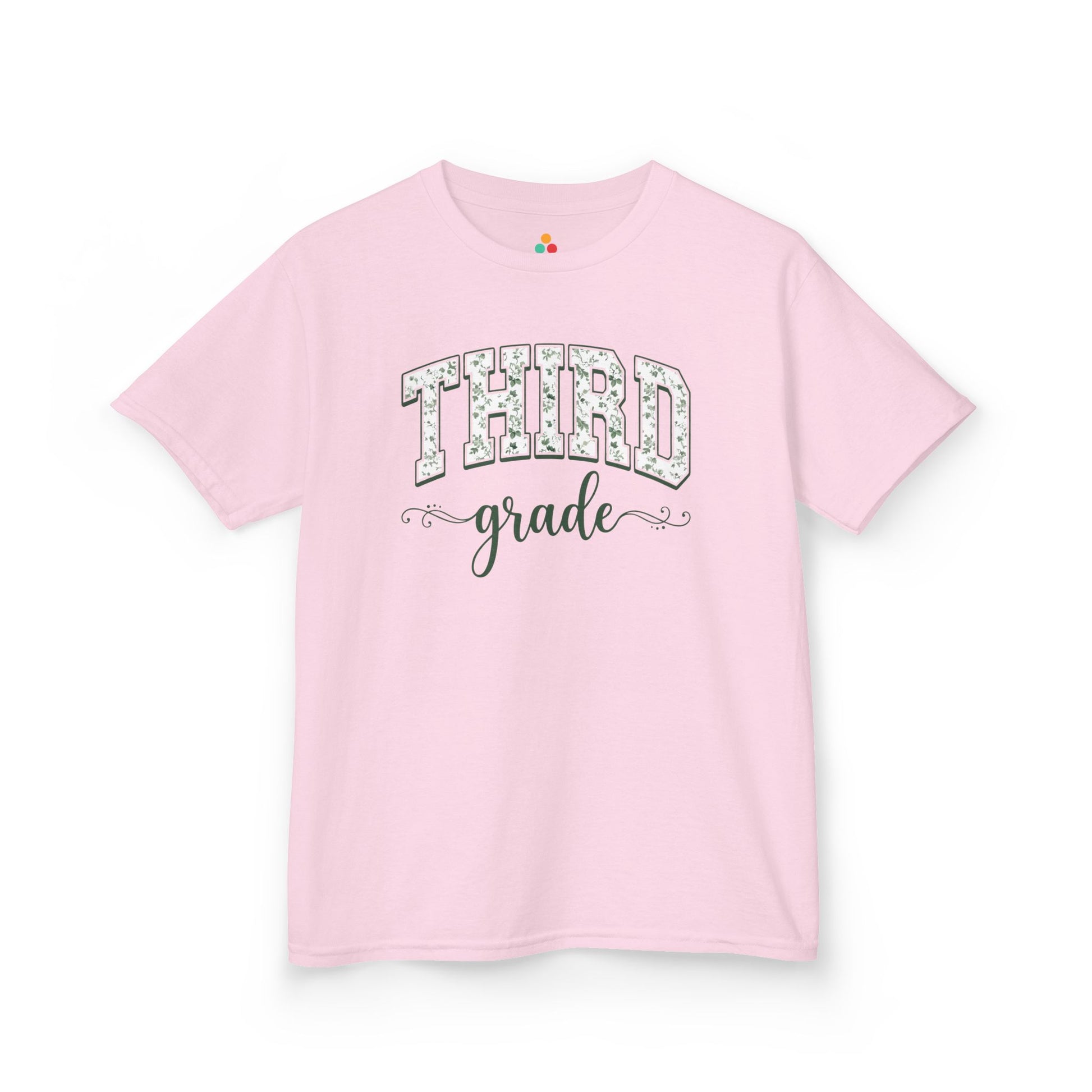Pink t-shirt with 'THIRD grade' text on a white background. TEEZOCA floral back to school tee for kids in third grade, a first-day pick parents find on Amazon and Etsy for class photos.

