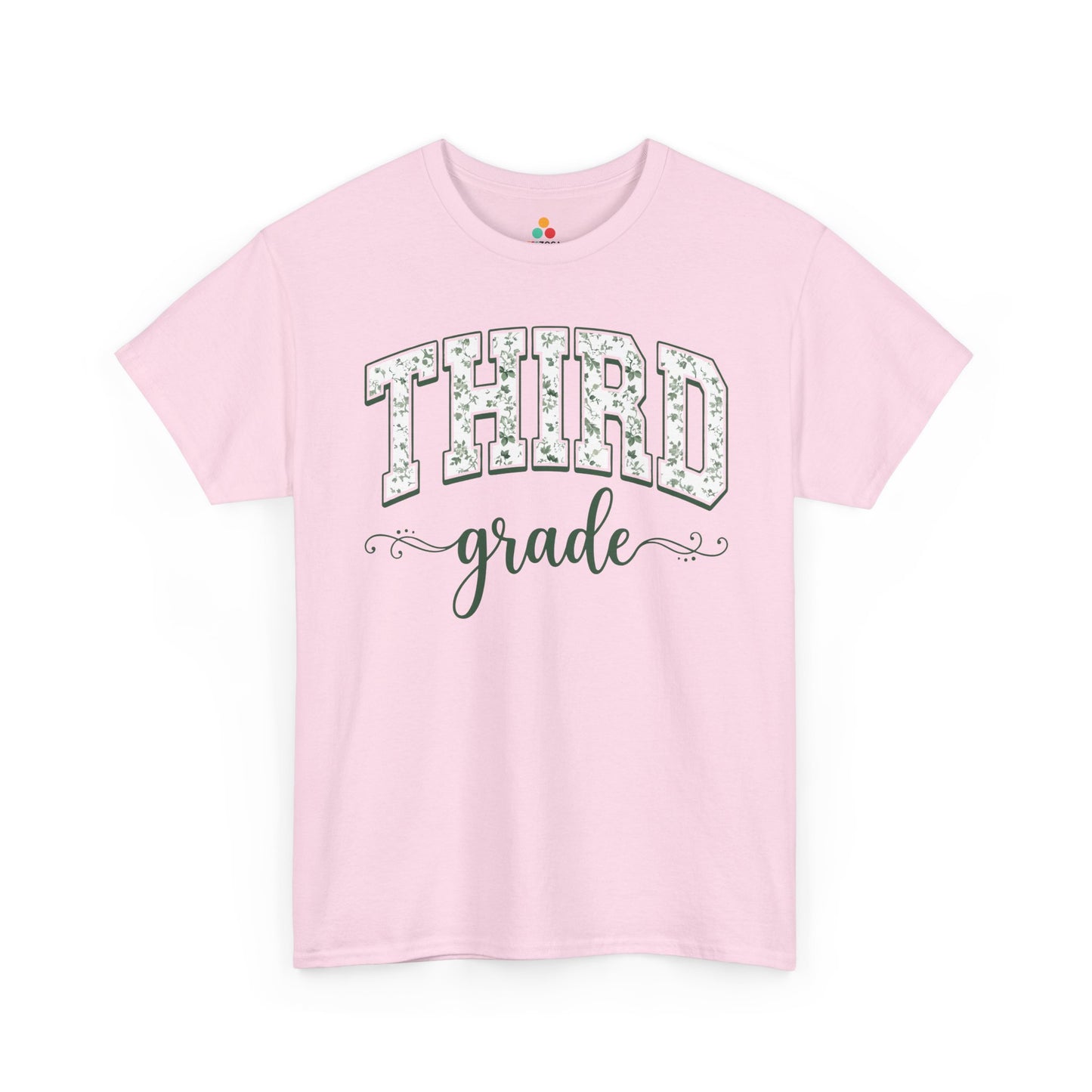 Pink t-shirt with 'THIRD grade' text on a white background. TEEZOCA third grade teacher shirt featuring sage floral varsity lettering, a cute back to school tee for teachers.
