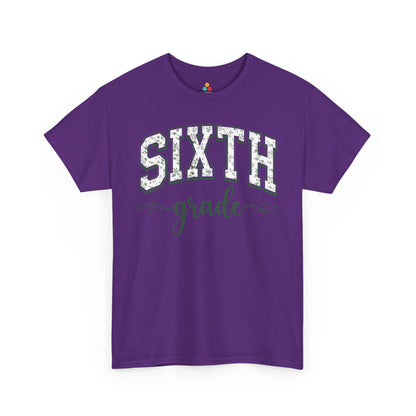 Purple t-shirt with 'SIXTH grade' text on a white background. Cute sixth grade shirt from TEEZOCA, a unisex adult tee worn by teachers, aides, and school staff.
