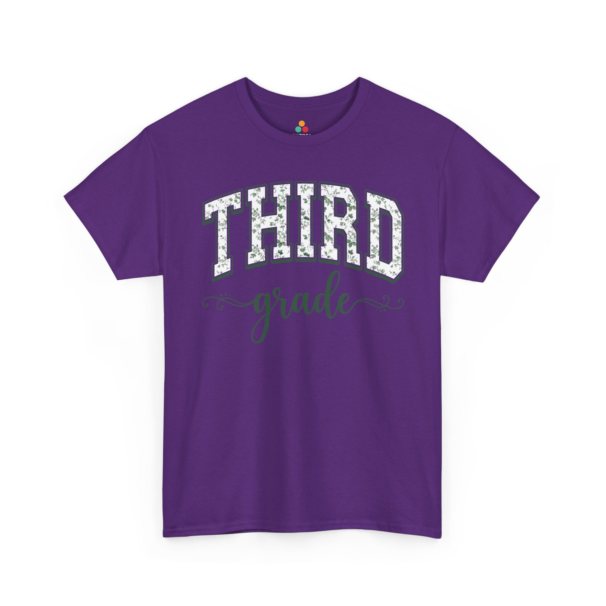 Purple t-shirt with 'THIRD grade' text on a white background. TEEZOCA floral back to school t-shirt for third grade teachers and staff, an adult tee found on Amazon and Etsy.

