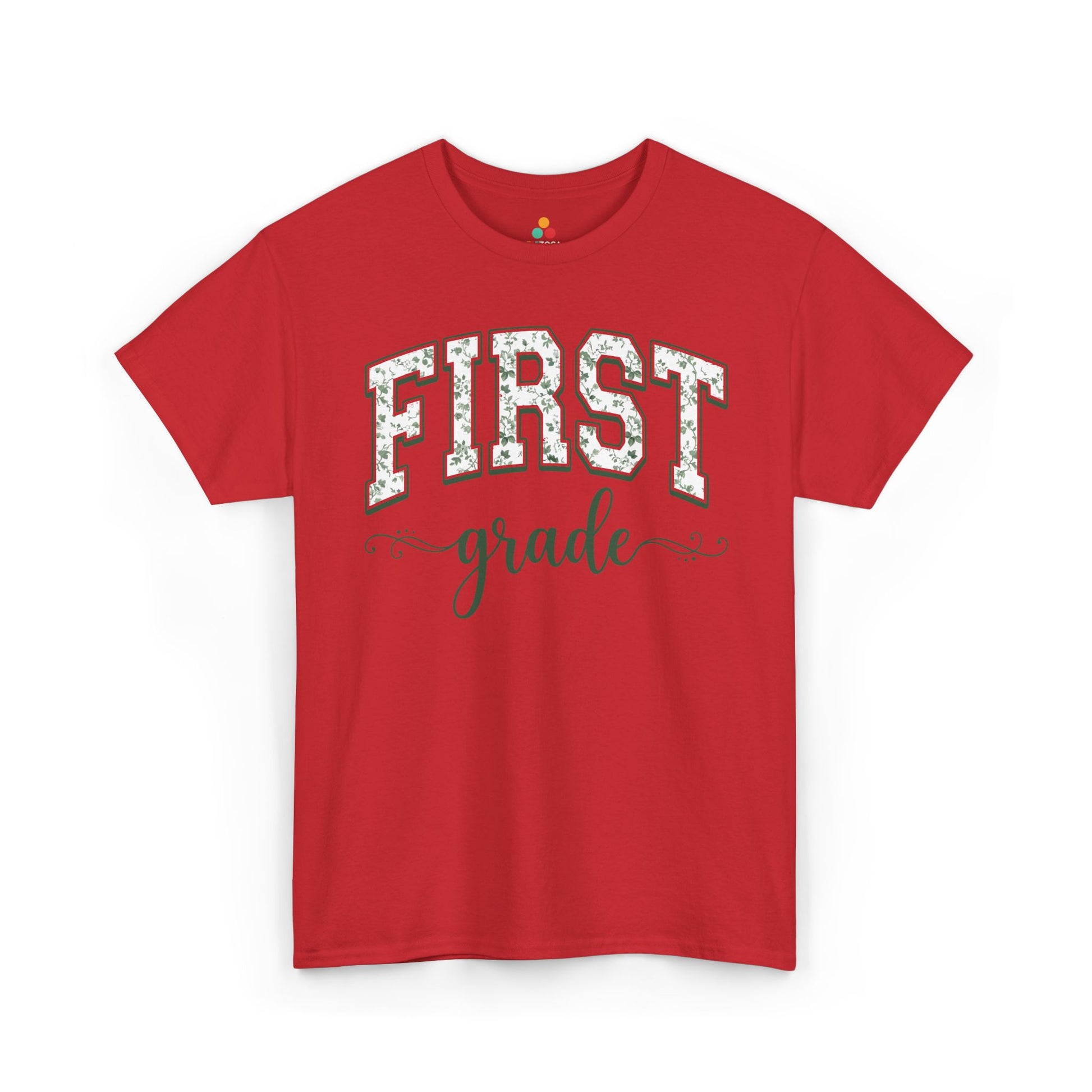 Red t-shirt with 'FIRST grade' text on a white background. Floral first grade tee from TEEZOCA reading first grade in arched varsity type, a unisex adult shirt for school staff.
