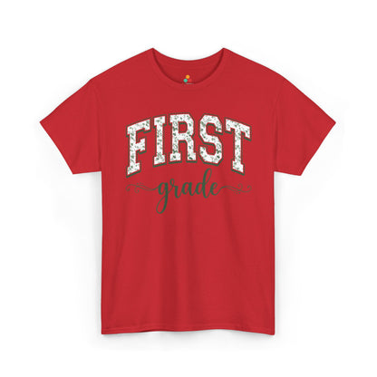 Red t-shirt with 'FIRST grade' text on a white background. Floral first grade tee from TEEZOCA reading first grade in arched varsity type, a unisex adult shirt for school staff.
