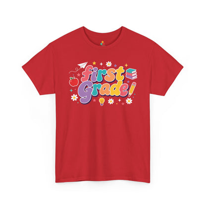 Red t-shirt with 'first grade!' text and graphics on a white background. For a back to school teacher shirt, this TEEZOCA t-shirt features “First Grade” text surrounded by an apple, pencil, books, light bulb, stars, and dots.